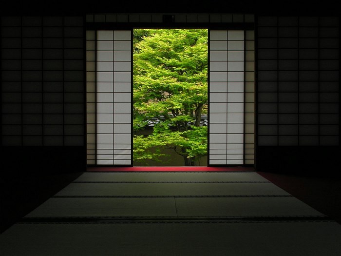 Japanese room with sliding doors and garden view