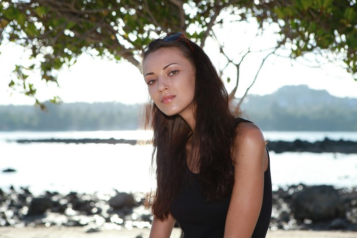 Anna Sbitnaya posing on a beach