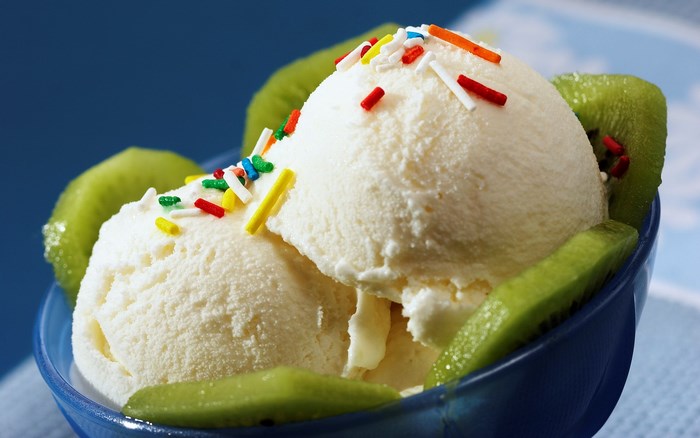 Ice cream with kiwi and sprinkles