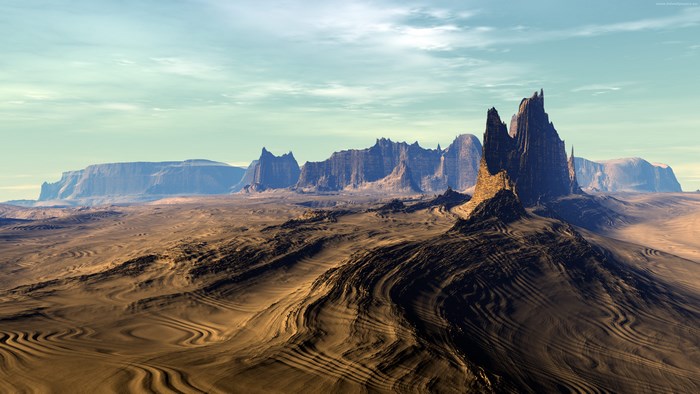 Alien desert landscape with rock formations