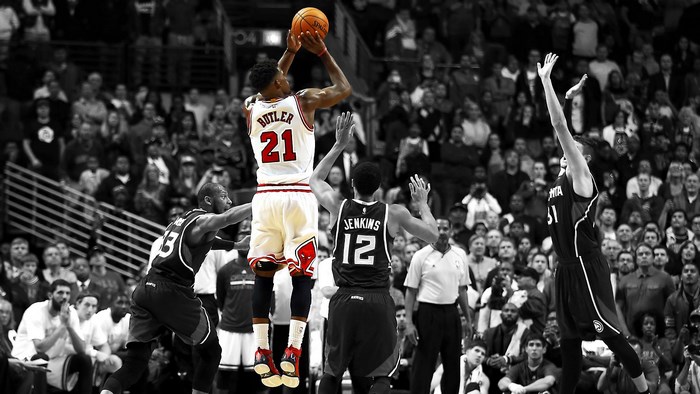 Jimmy Butler shooting a basketball