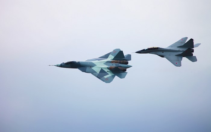 Sukhoi PAK FA and MiG-29 in flight