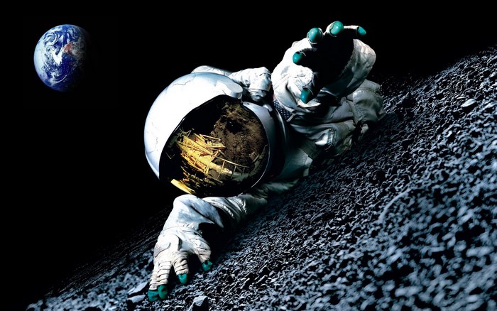 Astronaut on a rocky surface with Earth in the background