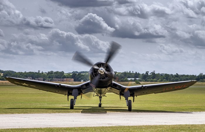 Vought F4U Corsair Fighter Plane on Grass Field