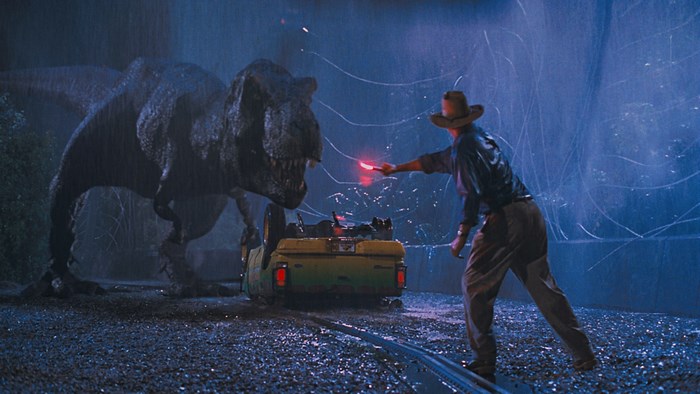 Jurassic Park Dinosaur Encounter with Man Holding Flare