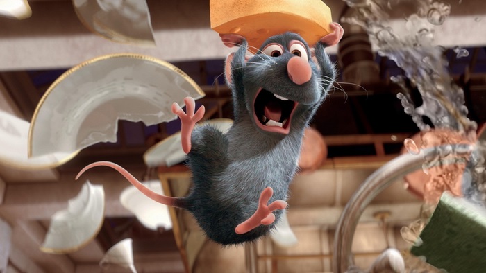 Remy from Ratatouille holding cheese