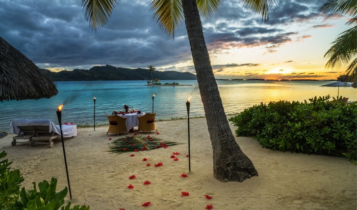 Romantic beach dinner at Bora Bora sunset