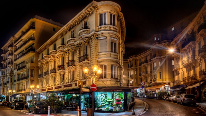 Street corner building at night in France 4K