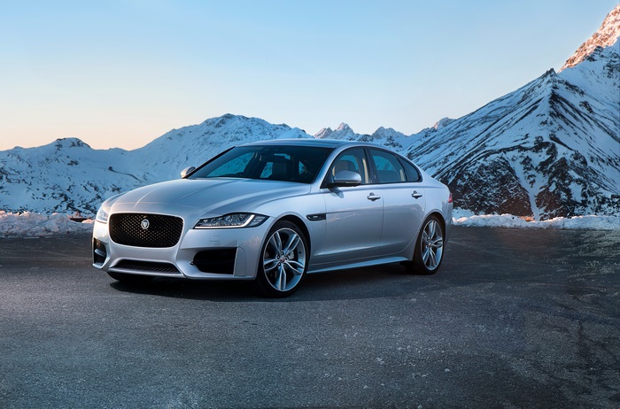 Silver Jaguar XF R Sport 4K in mountains