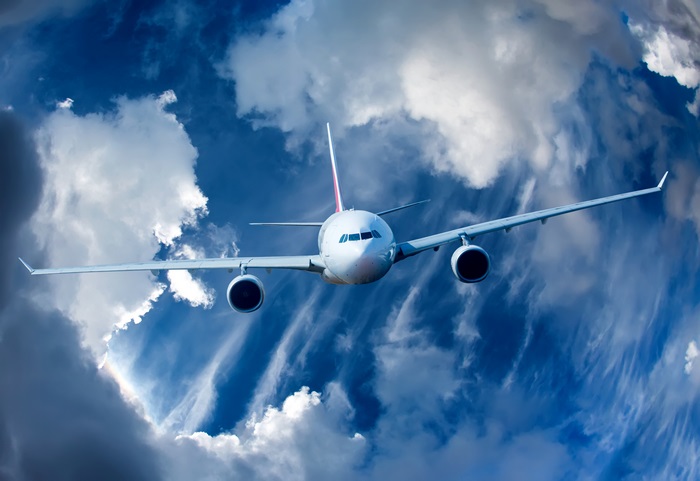 Airplane flying through clouds 4K