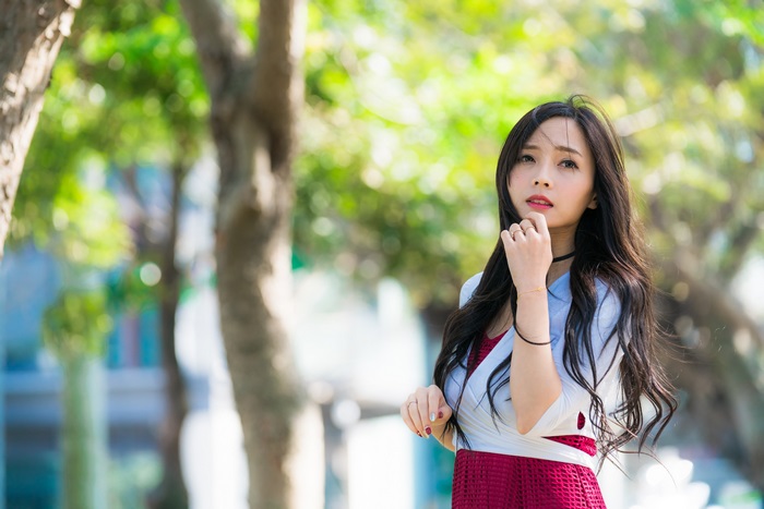 4K Portrait of Woman in Red Dress Outdoors