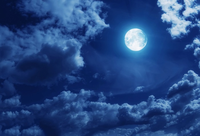 Bright Full Moon Shining in a Cloudy Night Sky 4K