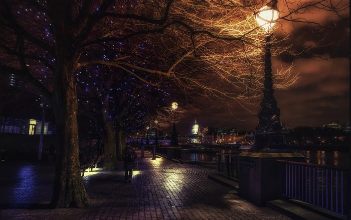 London Nighttime Urban Riverwalk with Lanterns and Trees