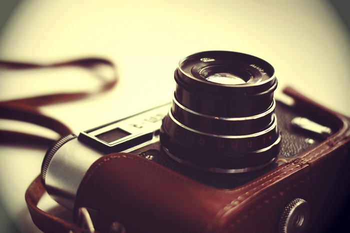 Vintage camera with leather case and strap