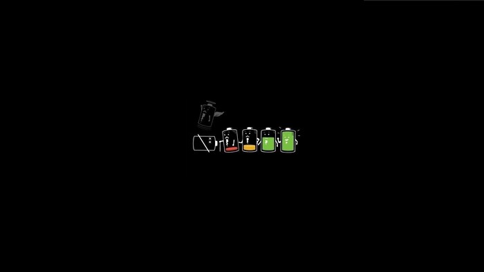 Minimalist humor batteries with faces on black background