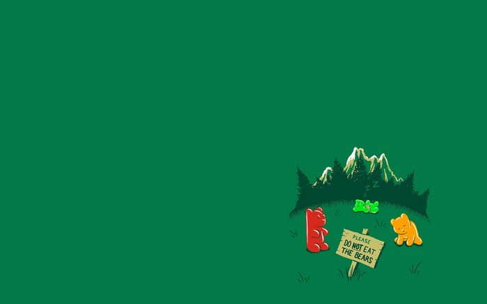 Gummy bears and frogs in a forest with a sign