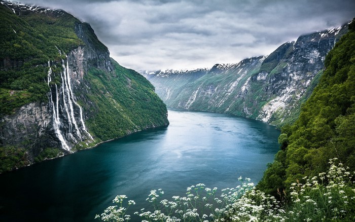 Geiranger Fjord Norway with Waterfalls and Wildflowers