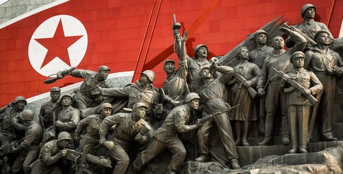 North Korean Monument with Soldiers and Flag