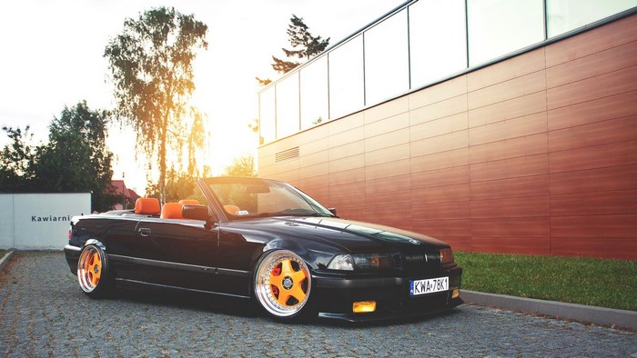 Black BMW E36 Convertible with Orange Accents