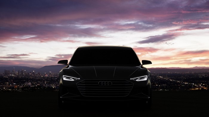 Audi Prologue concept car at sunset over city
