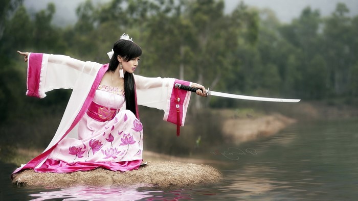 Woman in Kimono with Katana by Water