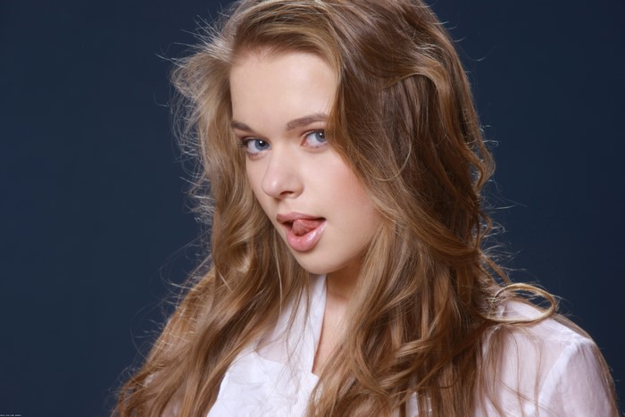 Young woman with blue eyes and blonde hair