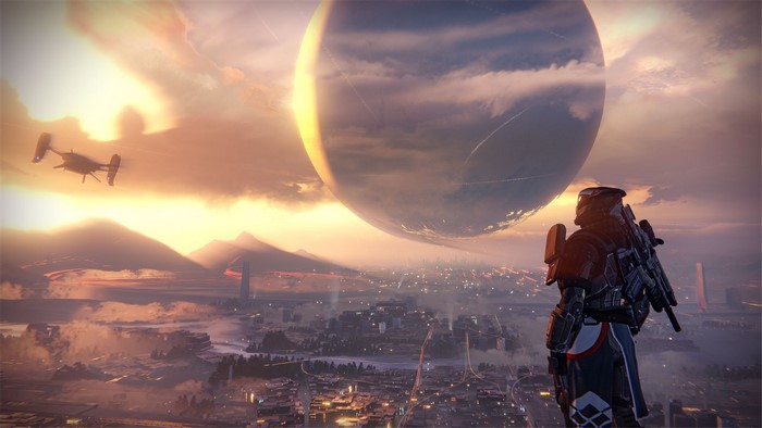 Guardian overlooking a city with a large planet in Destiny