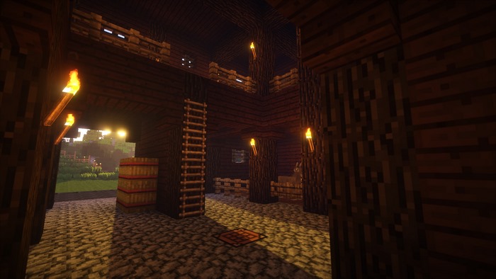 Minecraft interior with torches and wooden structures