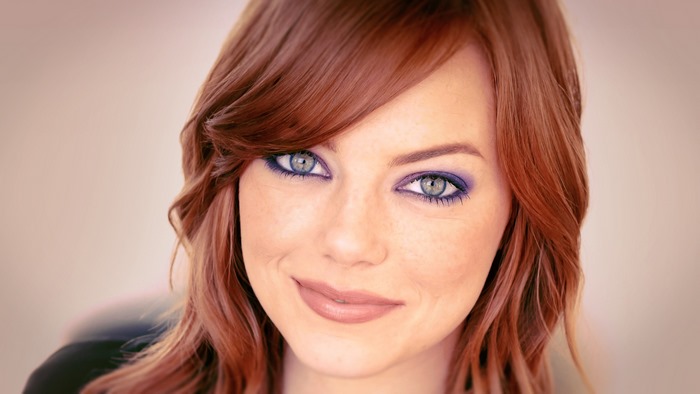Emma Stone with red hair and green eyes