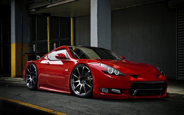 Red Modified Nissan 370Z with Custom Wheels