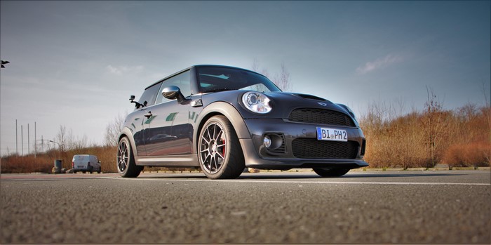 Dark Grey Mini Cooper S R56 parked on asphalt