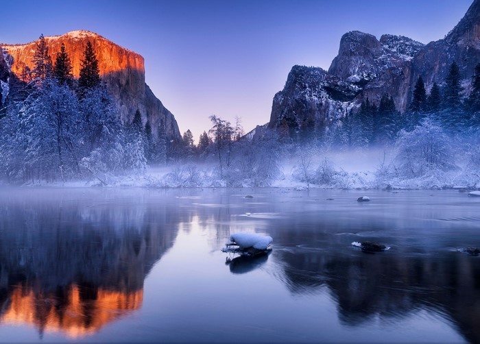Winter sunrise over Yosemite Valley with El Capitan and Merced River