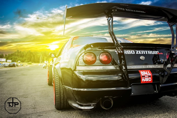 Black Nissan Skyline GT-R R33 with large spoiler