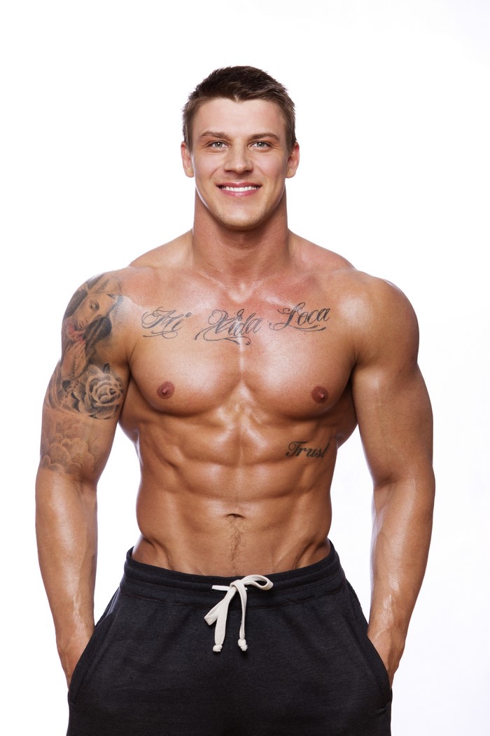 Shirtless muscular man with tattoos