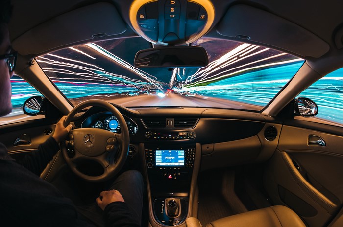 Mercedes-Benz car interior with light trails at night