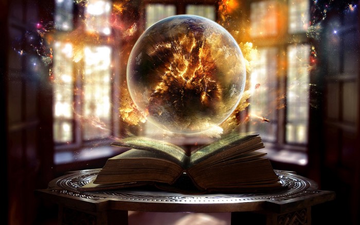 Fantasy art of a planet emerging from an open book