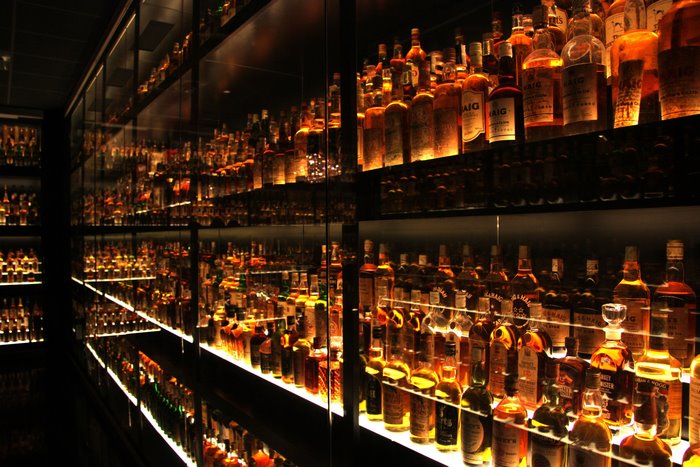 Alcohol bottles displayed on shelves