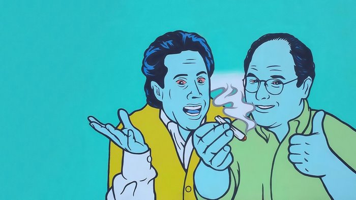 Jerry Seinfeld and George Costanza from Seinfeld smoking
