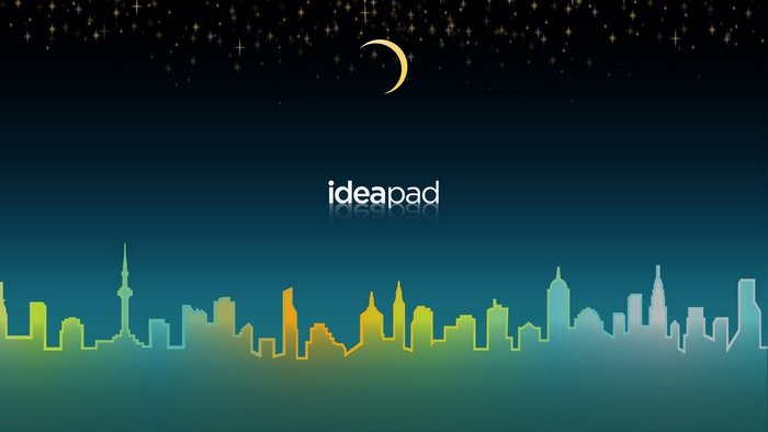 Lenovo Ideapad logo over a city skyline at night