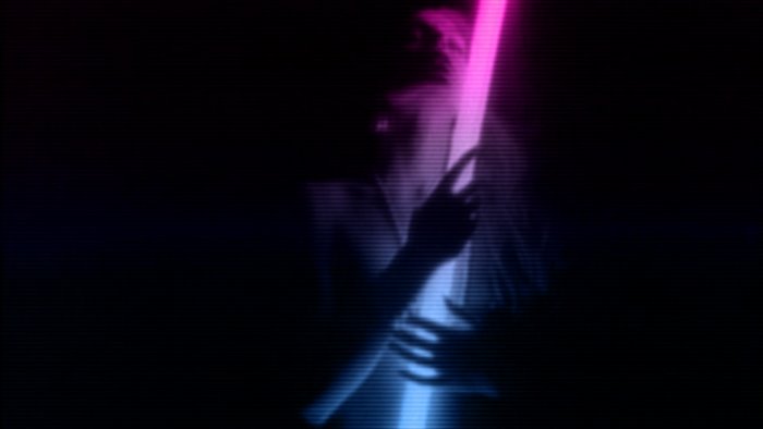 Person holding a neon light stick
