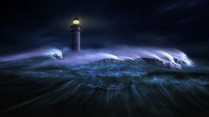 Lighthouse in a stormy sea at night