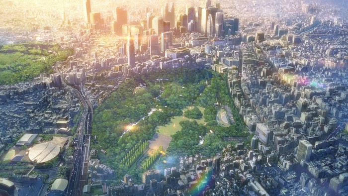 Sunset over a city with a large park