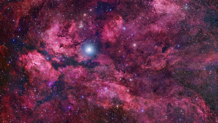 Nebula with bright star in space