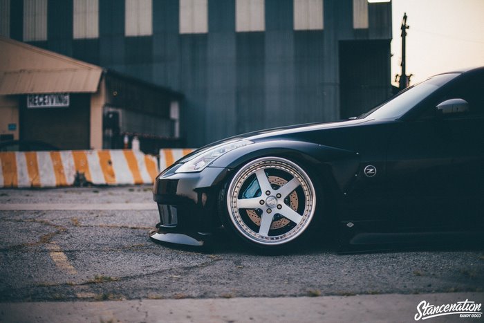 Black Nissan 350Z with custom wheels