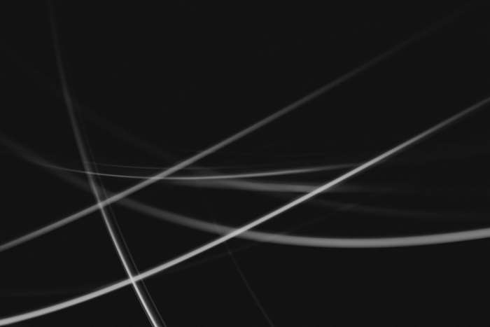 Abstract light streaks on black background 4K