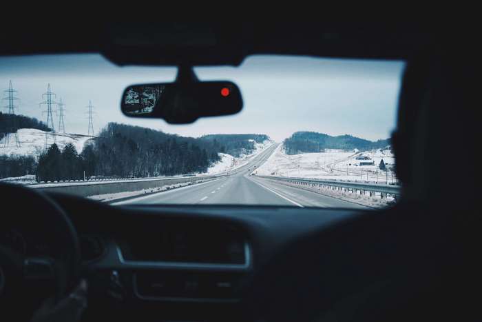 Driving on a snowy highway