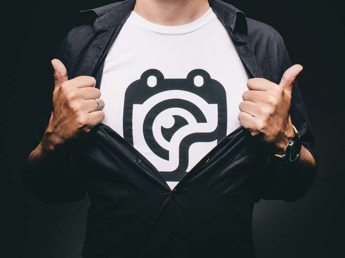 Man wearing a t-shirt with a logo
