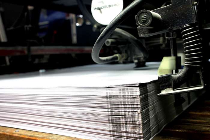 Vacuum Paper Lifter on Stack of Paper at Printing House