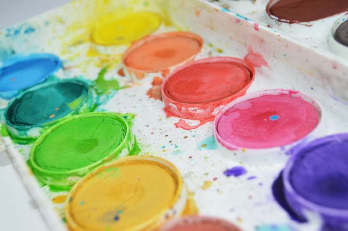 Watercolor paint box with colorful paints