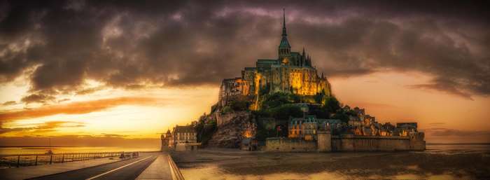 Mont Saint-Michel Abbey at sunset panorama
